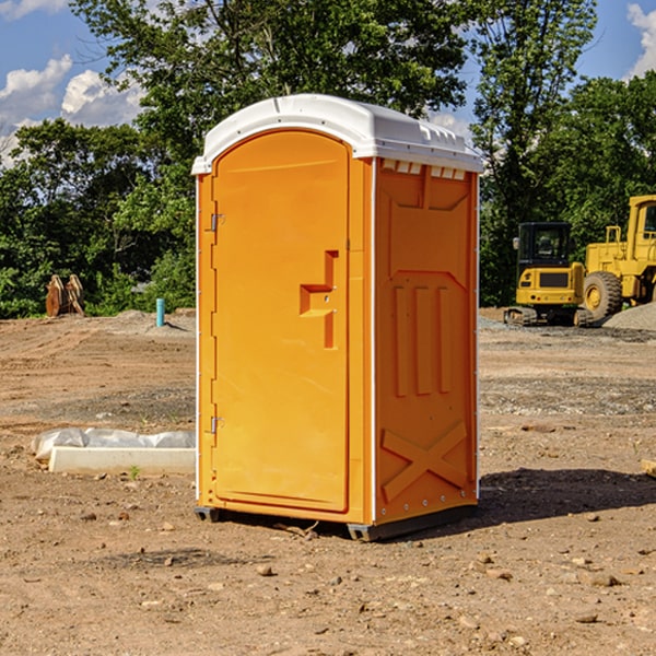 how often are the porta potties cleaned and serviced during a rental period in Wright